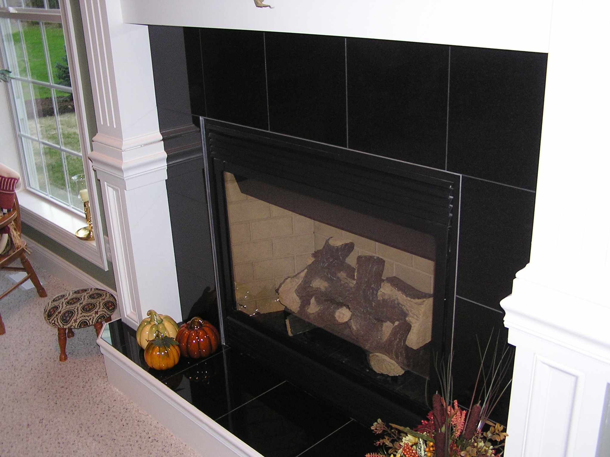 absolute black granite fireplace surround