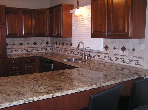 Travertine Backsplash with Copper Insets in Stow Ohio