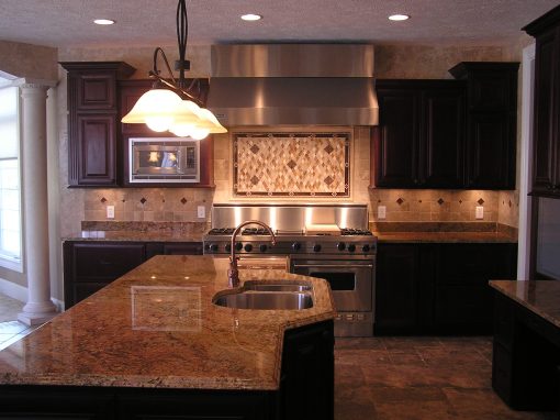 Custom Stone Backsplash with Crackled Glass Insets in Cuyahoga Falls, Ohio