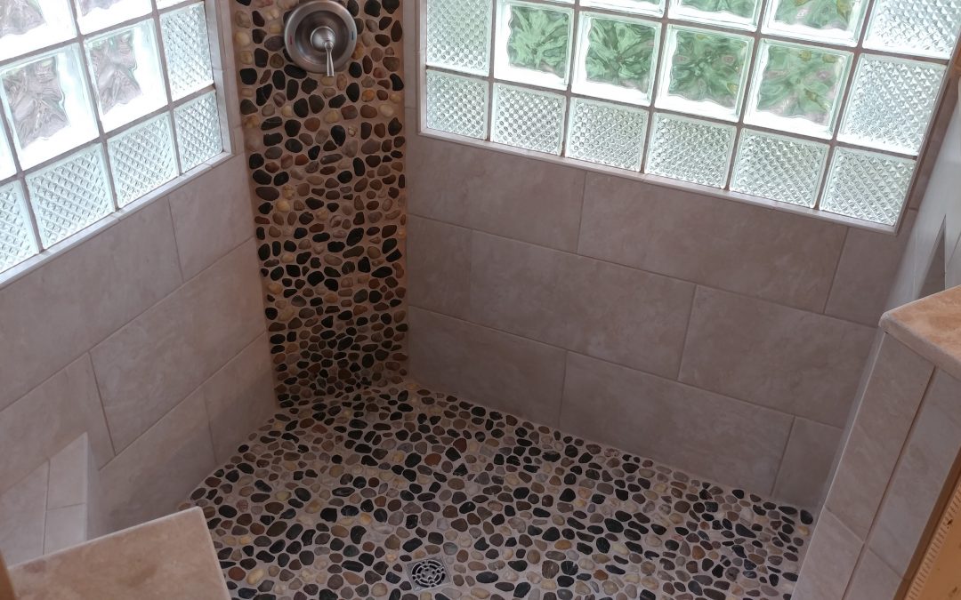 Porcelain Tile Shower with Pebble Stone Floors in Mayfield Heights, Ohio